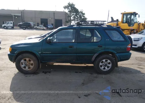 1999 Isuzu Rodeo Ls/Lse/S 3.2L z USA, uszkodzony, nr VIN 4S2CK58W7X4381253
